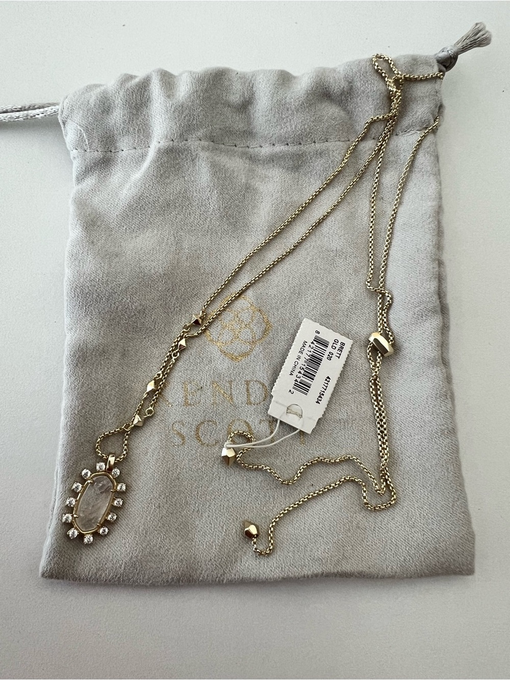 Kendra Scott Gold Oval Pendant Necklace with Clear Crystal Halo